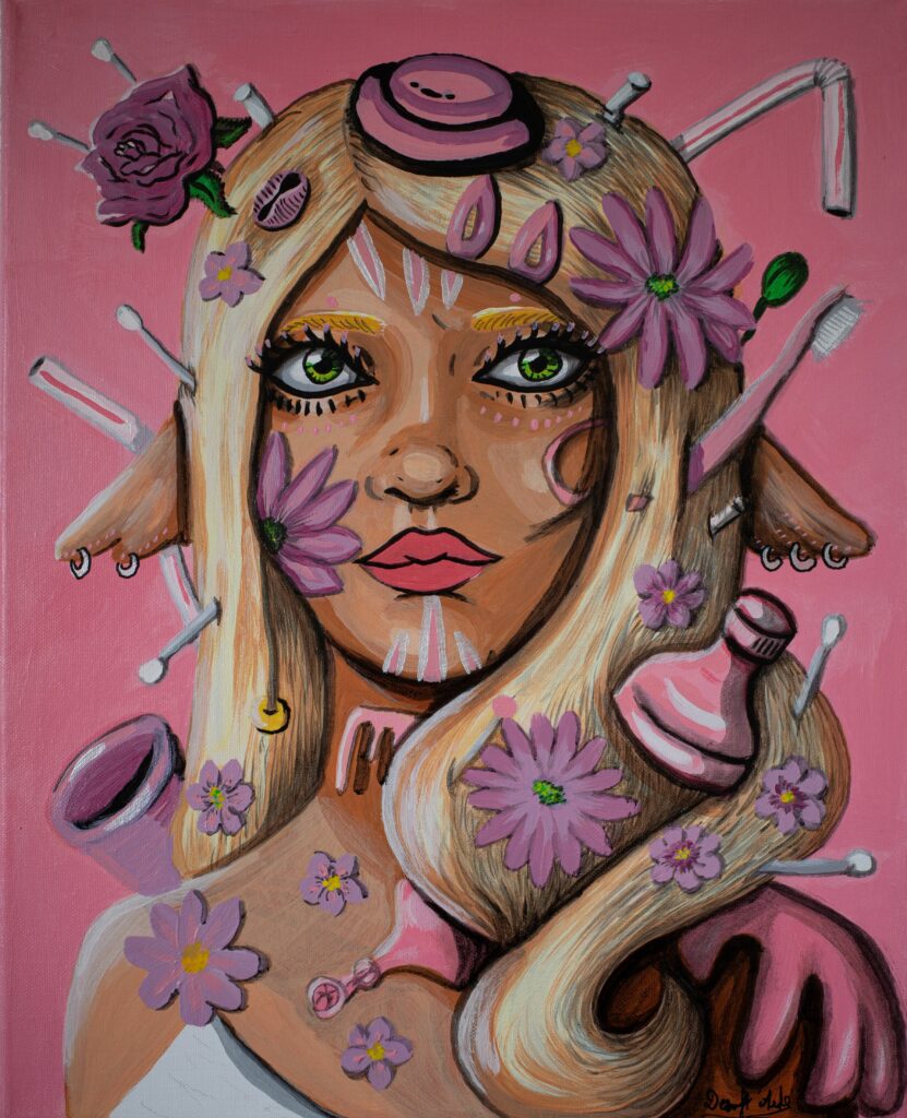 Photographie d'un portrait féminin écologique à la peinture acrylique de couleur rose.